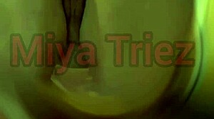 miya triez performs a strip tease with her big ass and natural tits