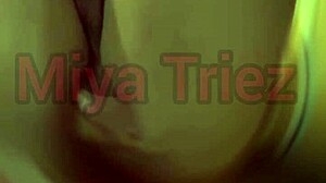 miya triez performs a strip tease with her big ass and natural tits