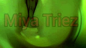 miya triez performs a strip tease with her big ass and natural tits