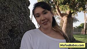 asian teen shares big boobs with friend outdoors