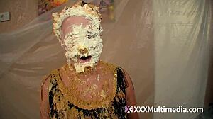 Two blondes get wet and messy, pieing each other in the face