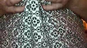 my big booty wife dances and shakes her ass, showing off her big tits and milf body.