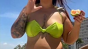 African Wife Flashes Stuffed Bikini On Beach