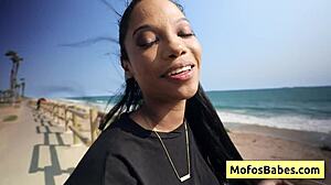 Stunning black beauty reveals big tits for fuck