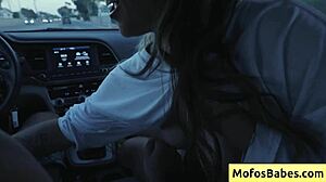 hey, check this sexy asian hottie playing with big boobs in car!