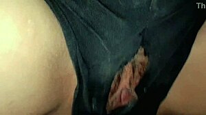 She licks her pussy until it's soaking wet, making her squirm in pleasure