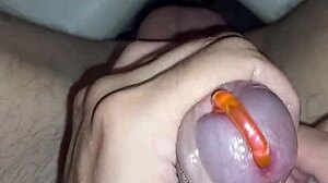 i stick magnets in piercing holes on my penis and cum from foreskin tightening