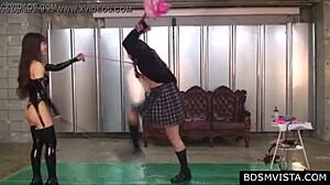 Hot Japanese Domina in Latex Trains Her Bound Slave