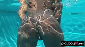 Naked ebony milf Ana Foxxx fingers her hairy black pussy outdoors under water