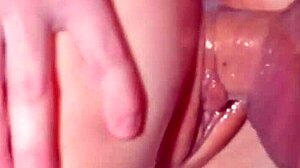 Semen Flows Continuously Between Her Lips in Puffy Pussy Scene