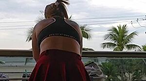 showing off your ass under that skirt on the balcony?