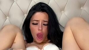 Watch this brunette American exchange student masturbating on webcam until she squirts and orgasms in high definition