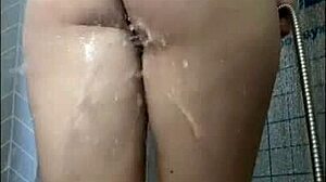 Teen shaves her pussy in the shower close up