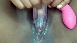 Ebony woman achieves intense orgasm