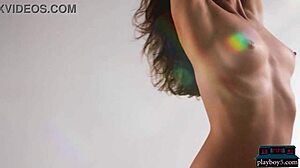 Russian beauty Nicole Winter teases with natural tits solo