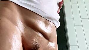 baby oil dripping on wet t-shirt for teasing play