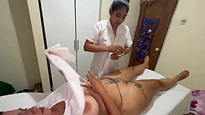 Lesbian doctor seduces busty patient with sensual massage. Their scissoring session gets steamy fast!