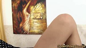 Lesbians in threesome urinate on each other.