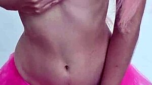 the sex fairy performs a petite striptease in softcore style