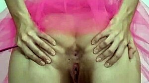 the sex fairy performs a petite striptease in softcore style