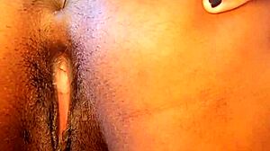 amateur girl with big tits squirts during anal masturbation