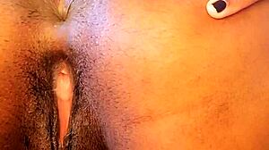 amateur girl with big tits squirts during anal masturbation