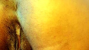 amateur girl with big tits squirts during anal masturbation