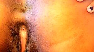 amateur girl with big tits squirts during anal masturbation