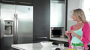 The blonde teen silently sucks her step daddy's cock in the group scene