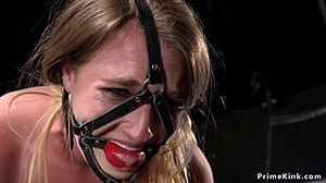 Why Is This Slim Blonde Tormented in Bondage?