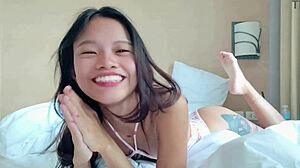 Lonely asian beauty teases with small tits in bed