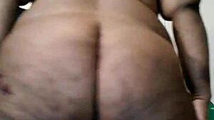 Ebony mature woman with 63-inch huge booty teasing