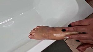 Sexy slut rubbing oil on her body, looking so hot