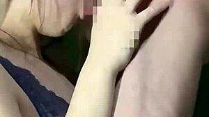 An eighteen-year-old amateur brunette with big tits seduces in erotic lingerie, delivering intense blowjobs and handjobs in the bedroom, culminating in cum swallowing with upward glances.