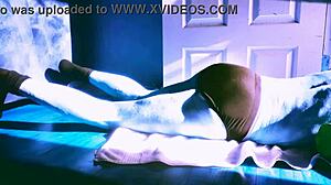 Intense Winter Stretching on Floor with Roller in Briefs for Sun Relief