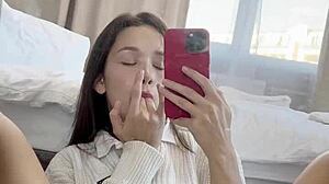 Is Ellie Leen Fingering Her Wet Shaved Pussy In Front Of The Mirror For Squirting?