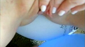 Sophie in jeans miniskirt fingering her pussy with two fingers