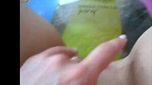 Sophie in jeans miniskirt fingering her pussy with two fingers