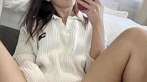 Is Ellie Leen Fingering Her Wet Shaved Pussy In Front Of The Mirror For Squirting?