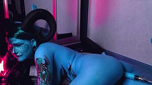 Hey, watch this tattooed blue slut with huge tits ride a machine!