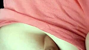 Close-up of a beautiful couple's intimate belly button massage session