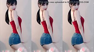 Watch this sexy Chinese girl dance up and down!