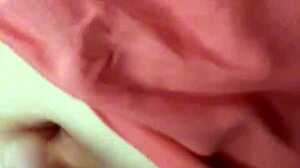 Close-up of a beautiful couple's intimate belly button massage session