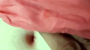 Close-up of a beautiful couple's intimate belly button massage session