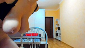 hot brunette wears bra, plays with tits, walks naked