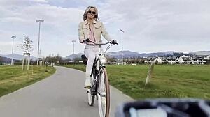 Beautiful blonde biker vlogs outdoor adventures on wheels