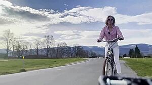 Beautiful blonde biker vlogs outdoor adventures on wheels