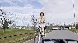 Beautiful blonde biker vlogs outdoor adventures on wheels