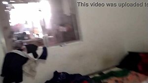 Latina amateur enjoys intimate moment with hairy pussy.