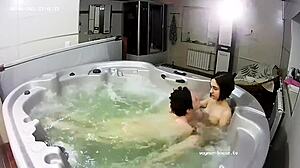young lesbian couple enjoys a steamy bath with intimate fingering
